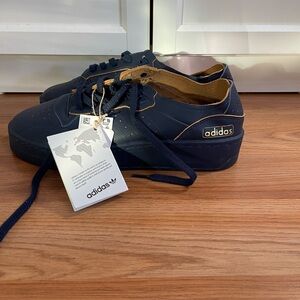 Adidas Men's Dark Blue and Gold Sneakers